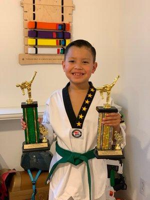 Super excited about earning his green belt!