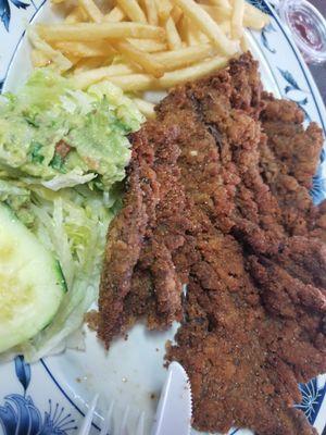 Milanesa with fries instead of beans. Hubby's favorite!