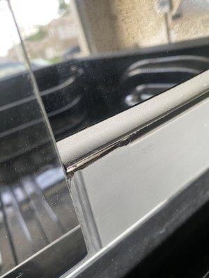 Back window plastic mold damaged