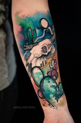 Watercolor tattoo Cow skull half sleeve by Jonlivefree Oc tattoo artist