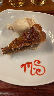 Pecan pie with cinnamon ice cream.    I know the cinnamon sounds  weird but trust me it's really good.