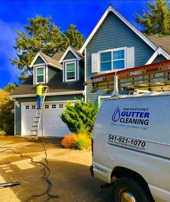 Cleaning Gutters.