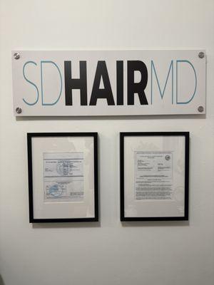 SD HairMD sign. Business license & permit.