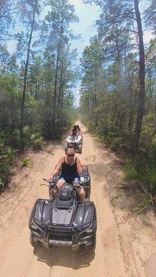 Forest trail riding on ATVs