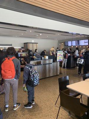 Long line in the food area