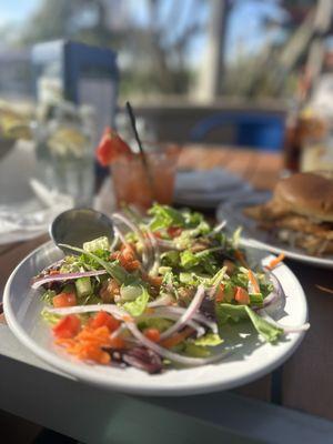 side salad that came with my fried chicken sandwich. really good creamy lemon vinaigrette.