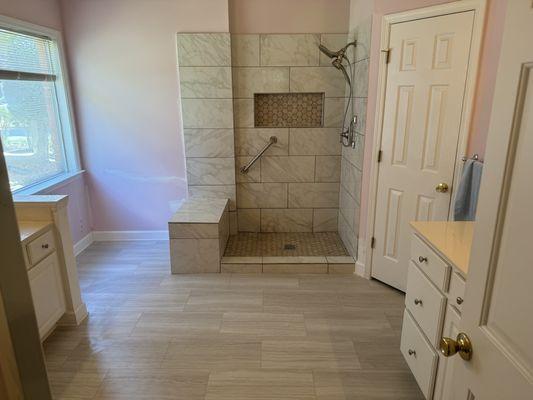 Walk in shower by remodeling work 123 "Transform your bathroom with a sleek walk-in tile shower, where elegance meets functionality."