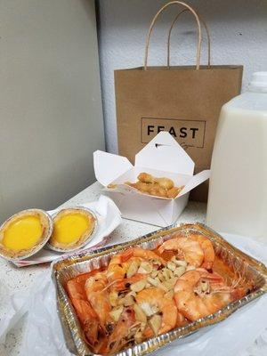 Egg tarts, salt & pepper fried calamari, 1/2 gallon soy milk, and 1lb shrimp with house special sauce (medium spicy)