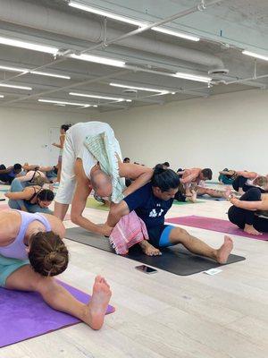 Tim Feldman adjusting me in Marichyasana A