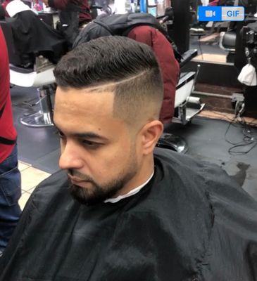 Fade. Comb over style. -by Luis