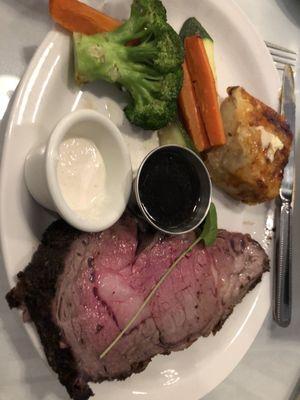 Prime Rib seasoned and cooked perfectly.  Veggies and Au Gratin potatoes.