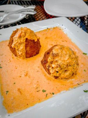 Fried mac and cheese balls with vodka sauce