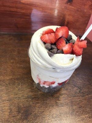 Banana whip with chocolate chips and strawberries