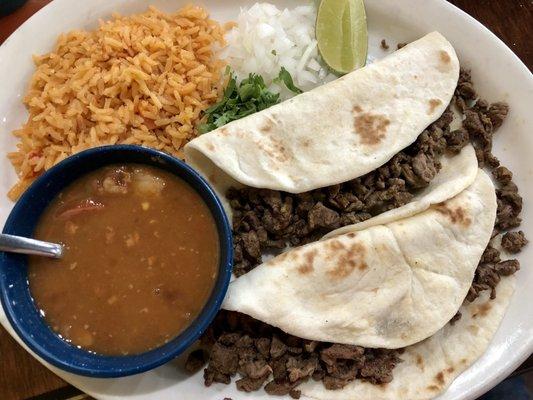 Carne Asada Tacos plate with rice & charro beans.