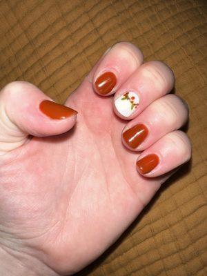 Autumn/Christmas mani with design on middle finger