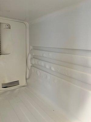 The technician used a blow dryer and the sides of the freezer are now distorted.