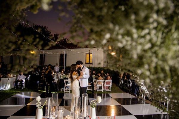 Beautiful wedding at Grapevine arbor. We did a vinyl wrapped dance floor, bistro lights, and tables/chairs.
 cpgtentsandevents.com