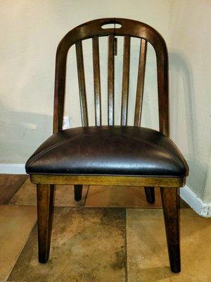 ARCH SIDE CHAIR WITH SIGNIFICANTLY SHORTER LEG TO THE DINING ROOM TABLE