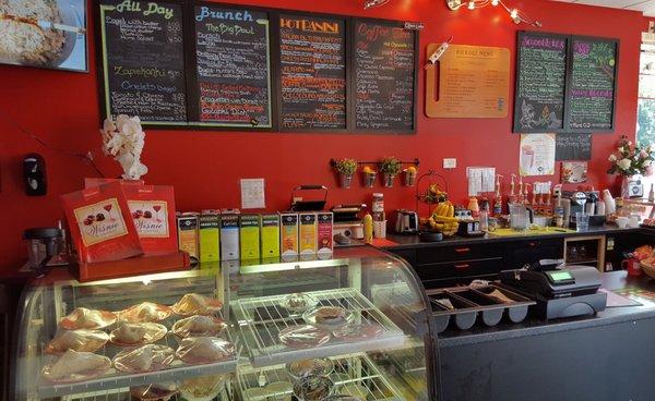 Main counter inside Janik's. Order from the menu on the wall, or ask for help.