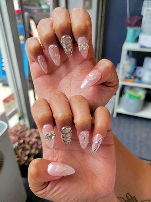 Extensions with chrome nail art