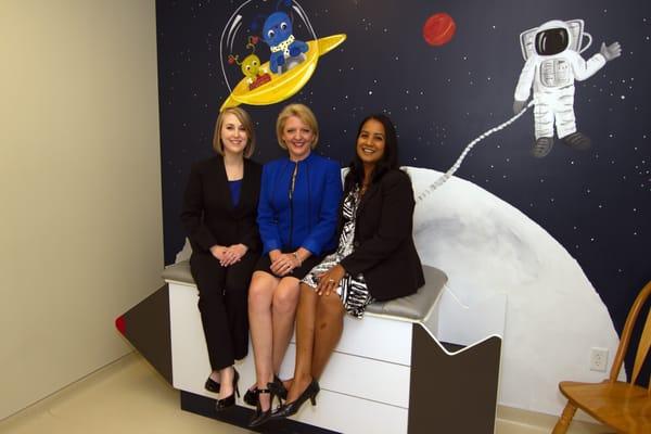 Dr. Berry, Dr. Rylie and Dr. Maun in our "Outer Space" patient exam room.