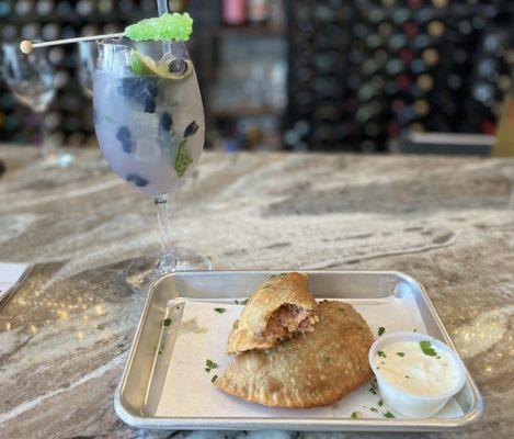 Blueberry lavender mojito and crab empanadas