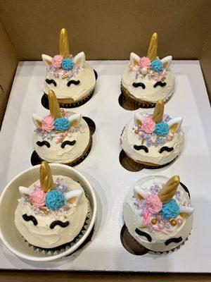 Unicorn cupcakes. The cupcake in the cup is vegan.