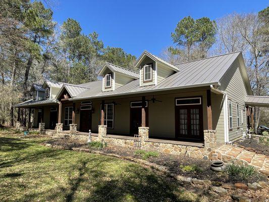 Exterior color match with refinishing of exterior doors and gutter painting as well.