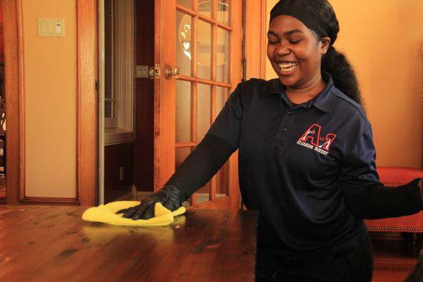 polishing coffee table (maid service) A-1 Cleaning Service