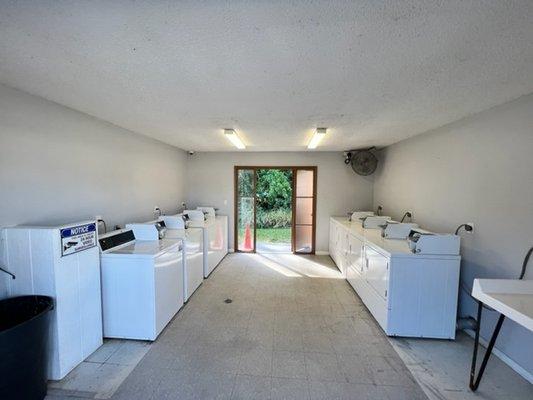 Laundry room on property here at Riverwood!