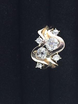 Ladies "meandering stream" diamond ring