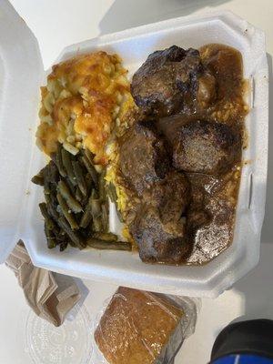 Ox tail, rice with gravy, string beans, and macaroni and cheese!!!!!