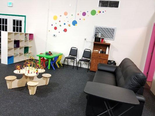 Our puzzles and games section, as well as a nice relaxing environment for parents. Even some free hot coffee!