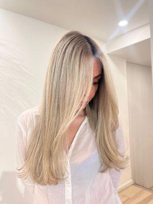 Blonde balayage highlights and root shadow with haircut