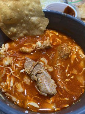 Pozole and freshly fried tostada