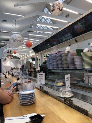 Conveyor belt sushi = a great time! Try the Baby roll!