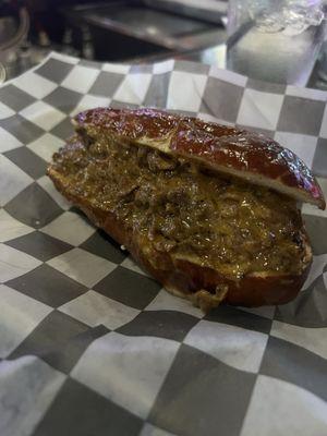 Cheesesteak on a pretzel bun