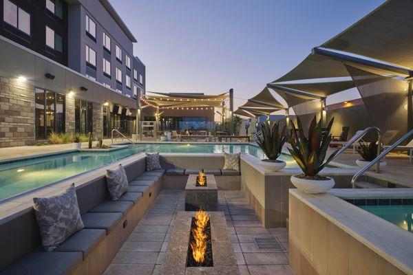 In-pool fire pit lounge available for rent on ResortPass or through the restaurant