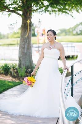 Trixie looks beautiful in her custom fitted wedding gown. The green belt and pink converse completed the look!