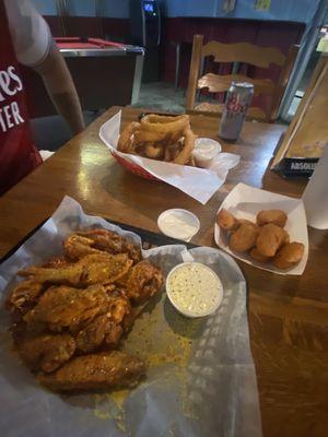 Mac and cheese bites, wings, onion rings.