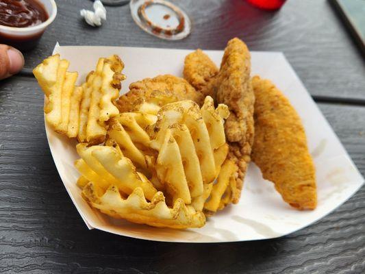 Chicken tenders and waffle fries