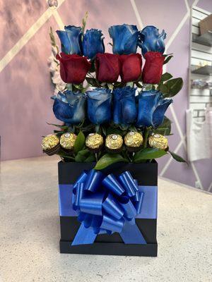 Blueish arrangement 
blue & red roses
Chocolate Ferrero's
in a black box