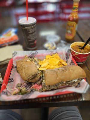 Steak and Cheese Sub with mushrooms and jalapeños.