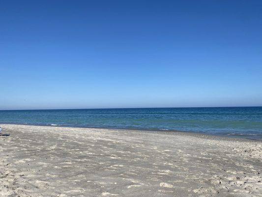 Beach has loose sand until your close to water, then it's packed.