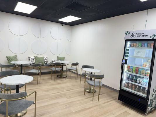 Lounge area with vending machine filled with healthy options