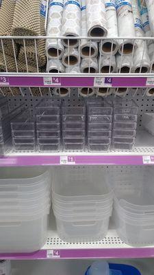 Love these plastic containers on the middle shelf!