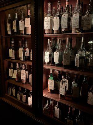 Dusty bottle cabinet