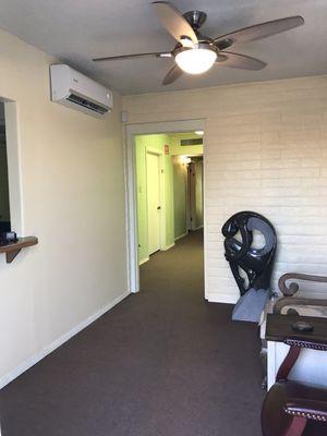 Reception area leading to 8 treatment rooms.