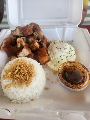 Lechon with garlic rice and egg