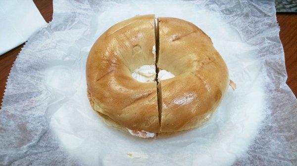 Plain bagel with lox cream cheese. Delicious